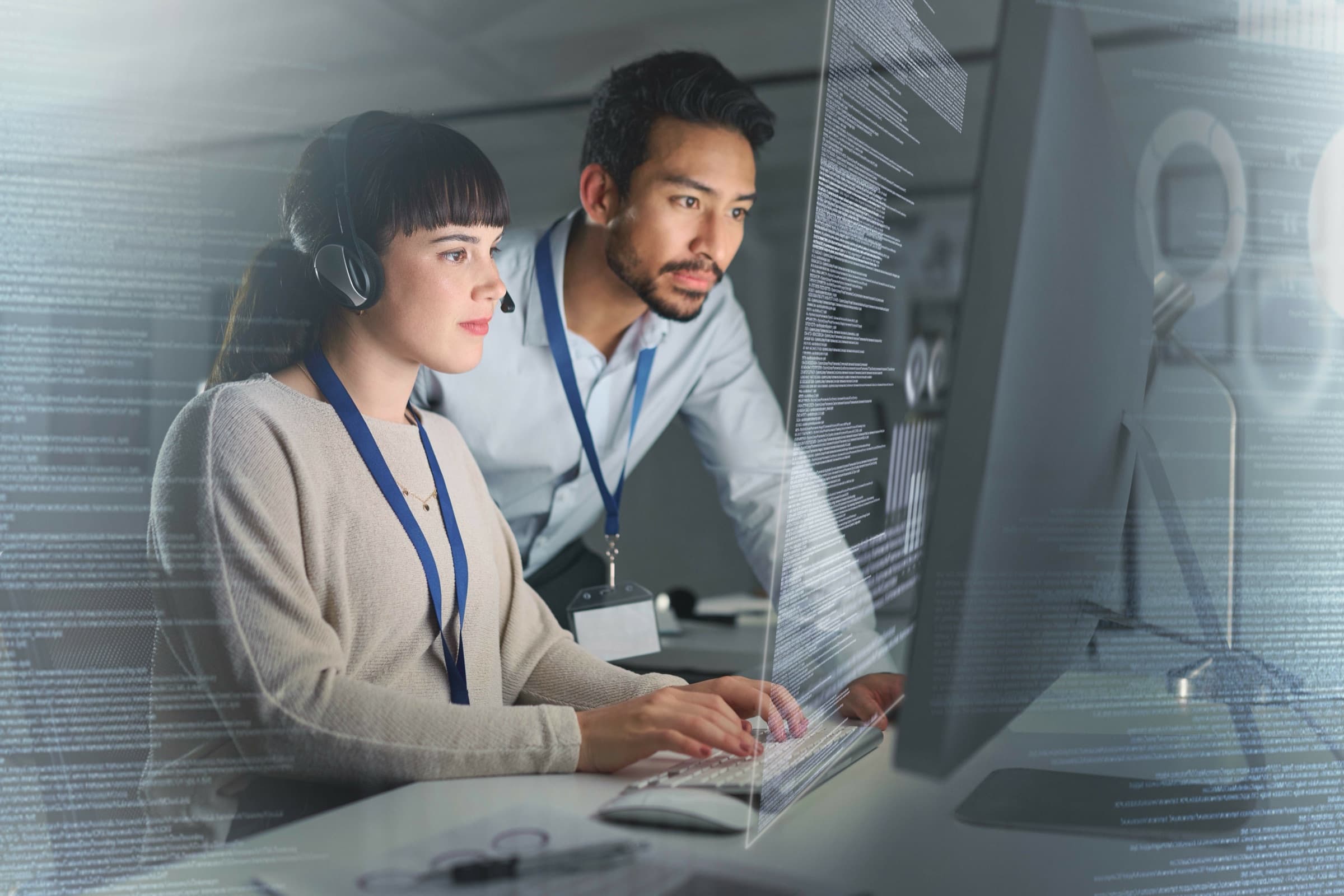 Technology operations specialists reviewing a monitored application