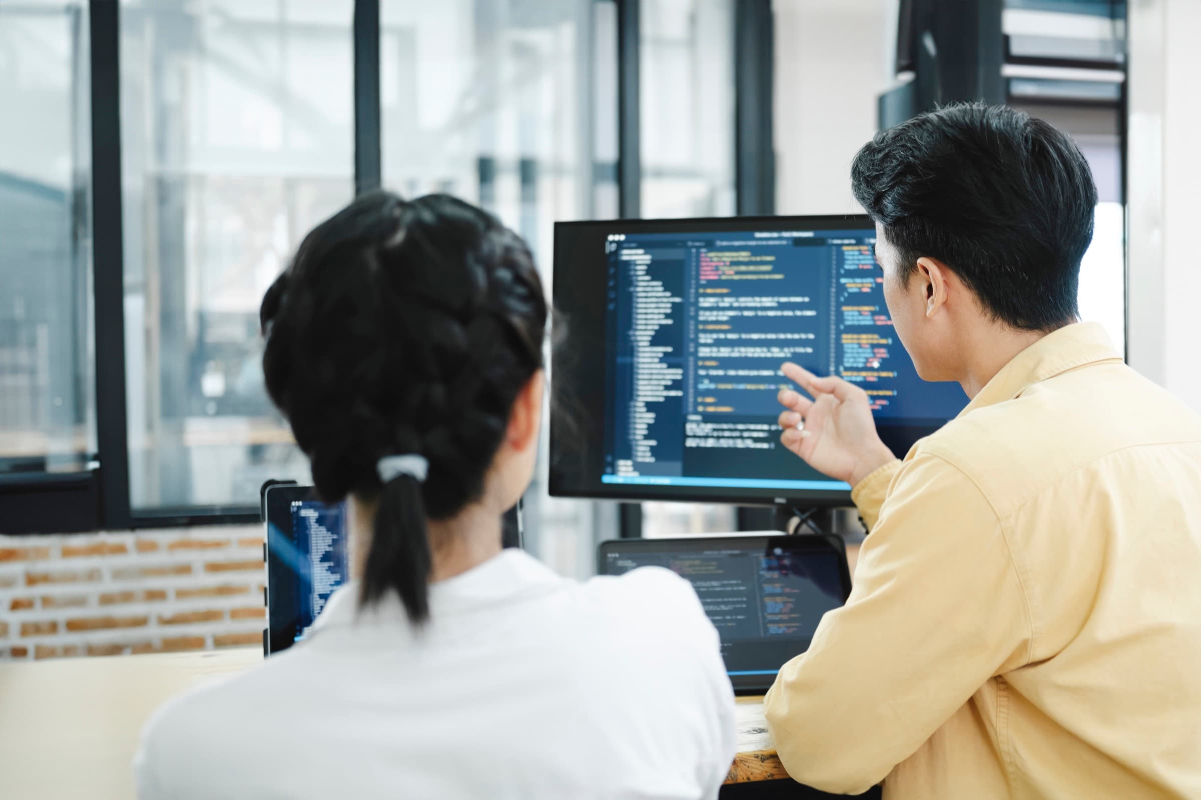 Software specialists collaborating on an operations platform